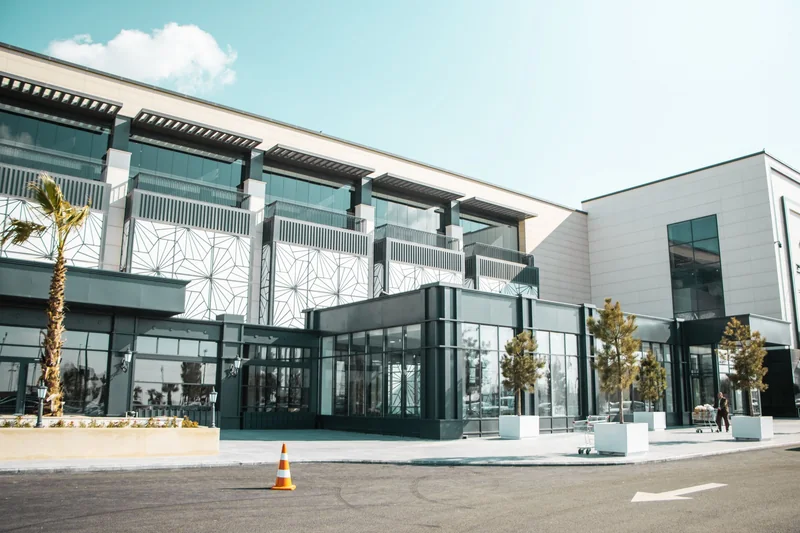 Clean glass front of a modern building in bright sun