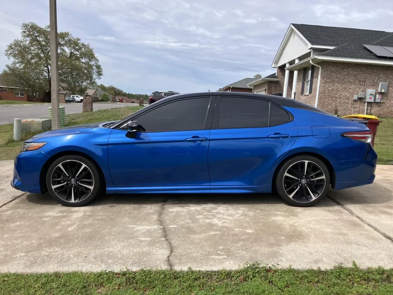 Blue Toyota Camry with tinted windows — a job by RJ’s Tint Shop in Crestview, FL