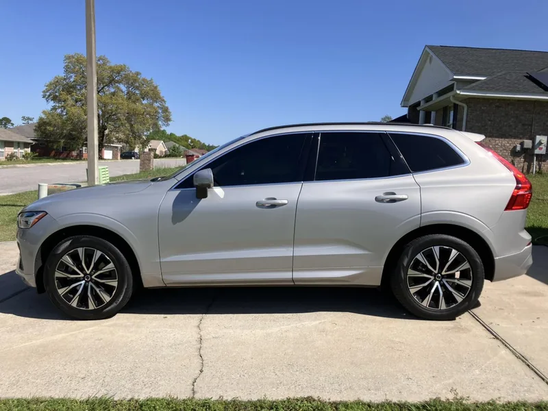 Silver Volvo XC60 with tinted side windows — a job by RJ’s Tint Shop in Crestview, FL