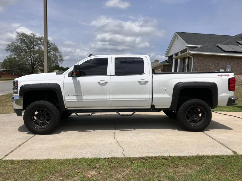 White Chevrolet Silverado pickup with tinted windows — a job by RJ’s Tint Shop in Crestview, FL